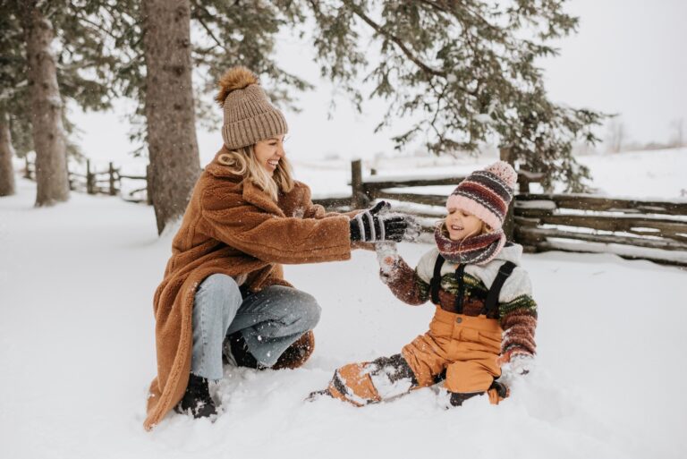 Joyful winter playtime with family in the snow