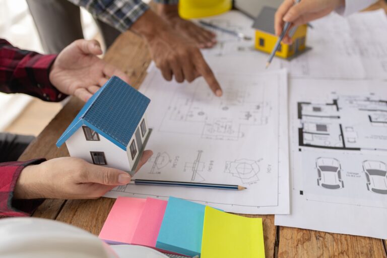 Interior designers and engineers and architects work together to plan the construction of the house