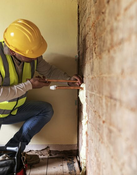 Contractor remodeling the home interior